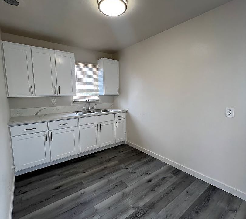 2nd image of 10019 S Hoover St #7A