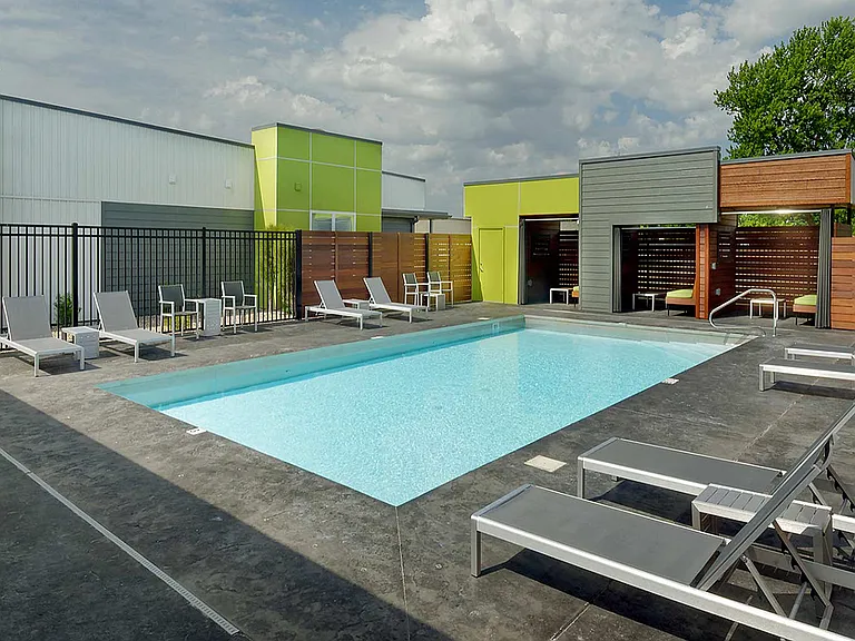 Pool with loungers and cabanas
