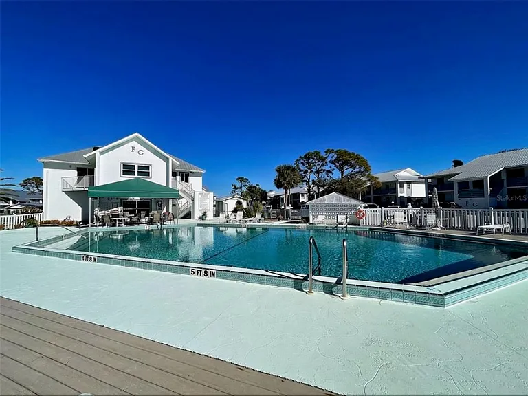 Pool located across the street from the unit