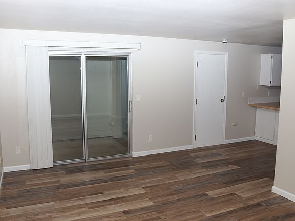 Living room opens to covered patio