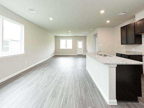 Kitchen and Dining Area to Family Room