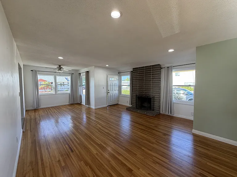 Spacious living & dining areas; decorative fire place