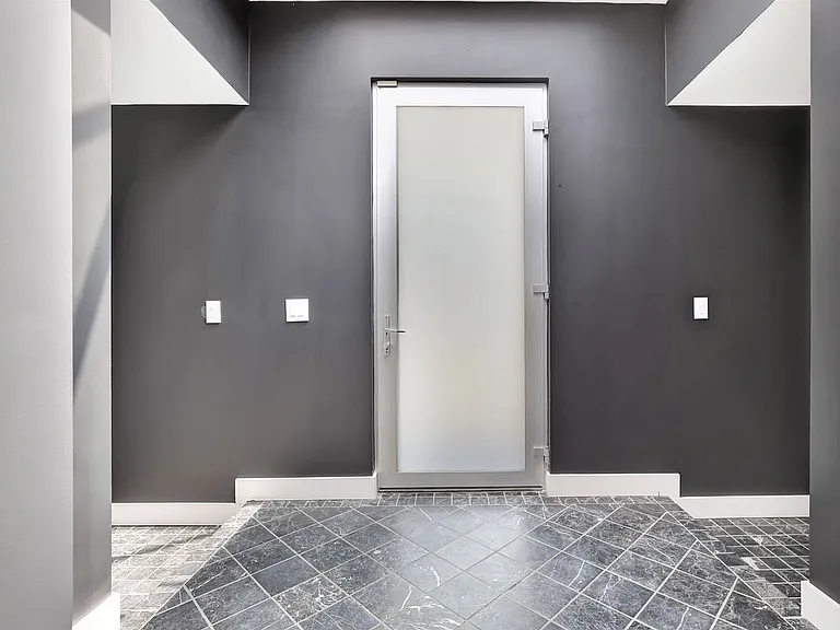 Entry way with skylight and abundant natural light