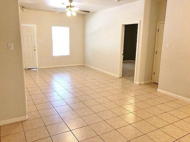 main living area, door to downstairs bedroom
