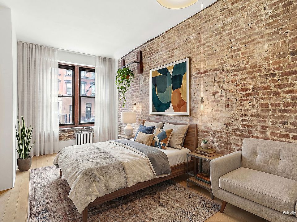 1st image of 241 E 7th St APT 1B