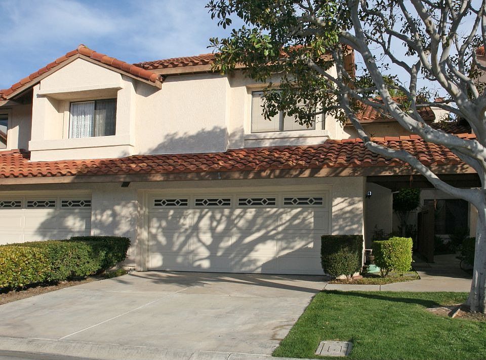 well maintained exterior with tile roof