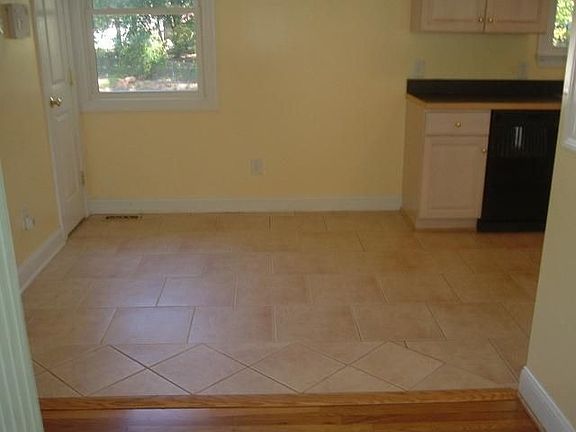 Nice size breakfast area with new tile floors.