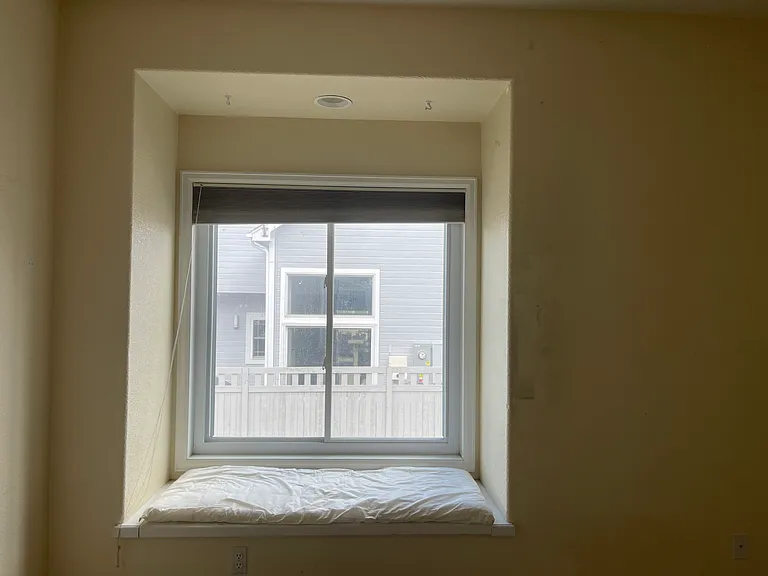 Window seat in 3rd bedroom on first level

Attached bathroom