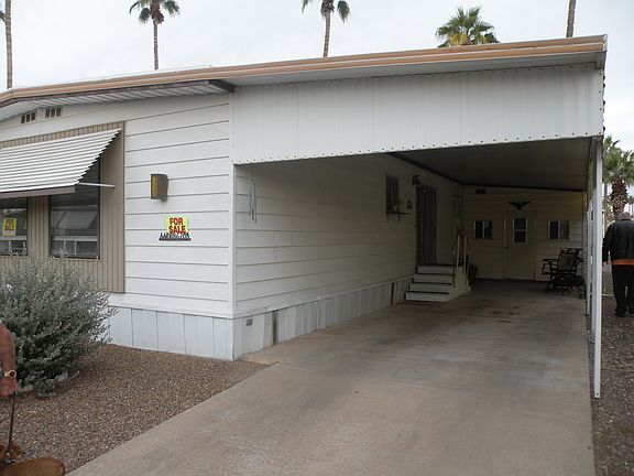 Driveway with newer build on
