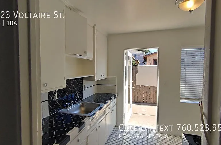 5123 Voltaire St — Photo 12
