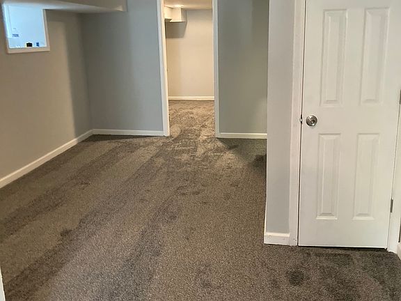 Finished basement with full size walkout door to the backyard.