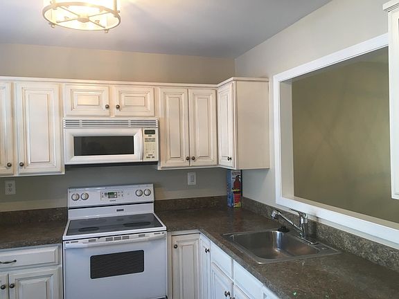 Large fully updated Kitchen open to Dining Room