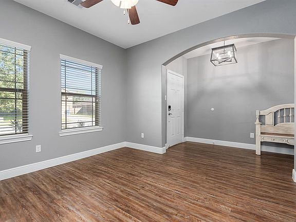 This flex room is to the right when you walk through the front door and has a view of the front of the home.