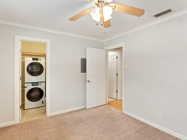 Secondary bedroom with washer and dryer