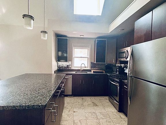 Kitchen with skylight