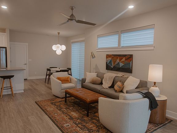 Living room plus 1/2 bath and office on main floor.