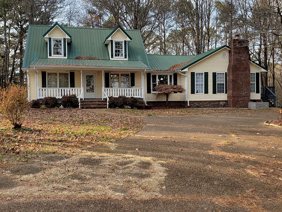 Front house w/ wrap drive