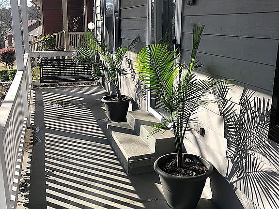 Front porch with swing.