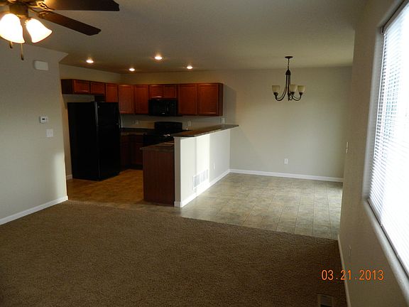 Living room looking towards kitchen/dining room