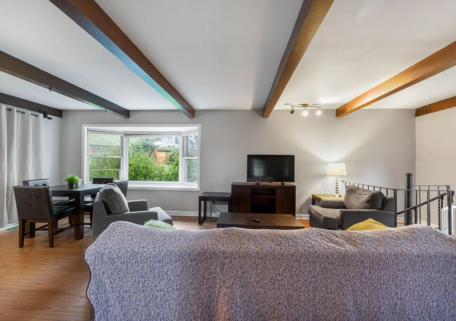 Home-Like Living with Sunroom, Attached Garage & In-Unit Laundry — Photo 3