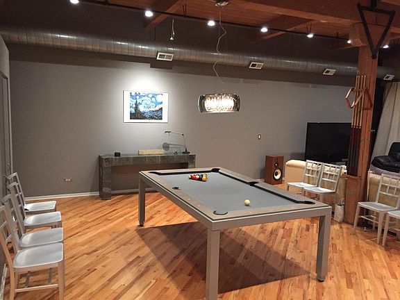 Converts to a pool table (available with rental if desired)