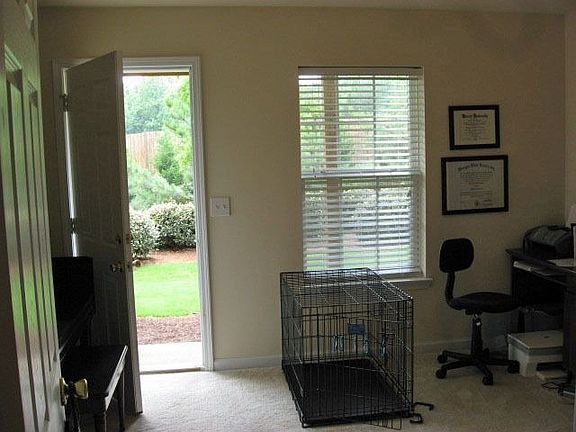 First level bedroom/bonus room with access to outside.