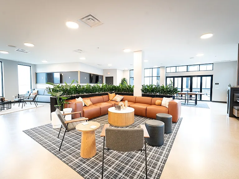 Experience modern comfort in this stylish lounge, perfect for relaxation and socializing.