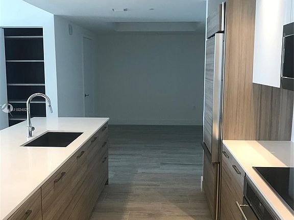 WONDERFUL KITCHEN WITH ISLE AND DEN OR FORMAL DINING ROOM