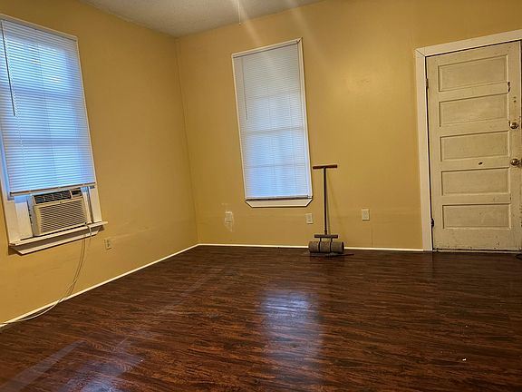 Front room with front door on right hand side of picture. 
The wall color in this picture really doesn't match the true light cream color walls. It's more like the next picture of the same room.