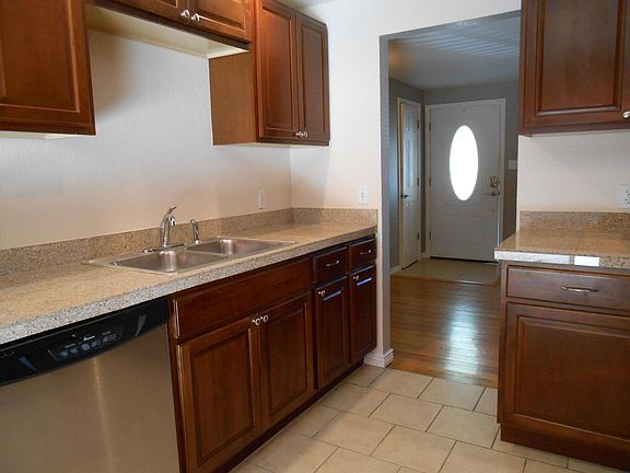 Walnut finished kitchen cabinets