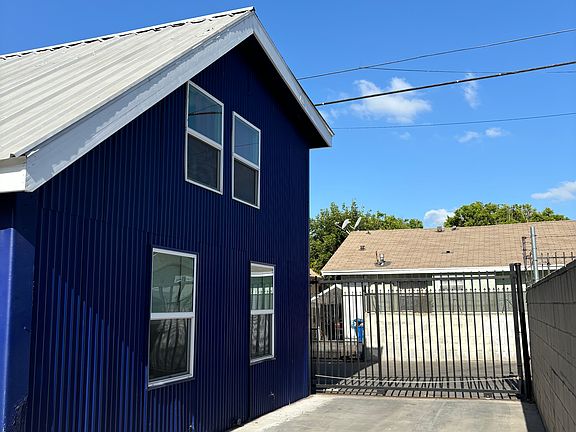 Automatic secure gate to enter back house.