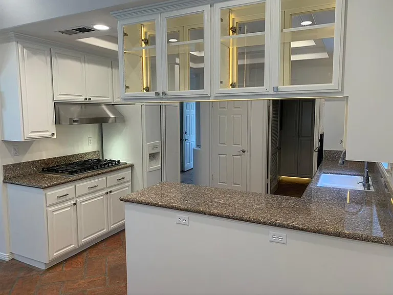 Dining to kitchen and laundry room