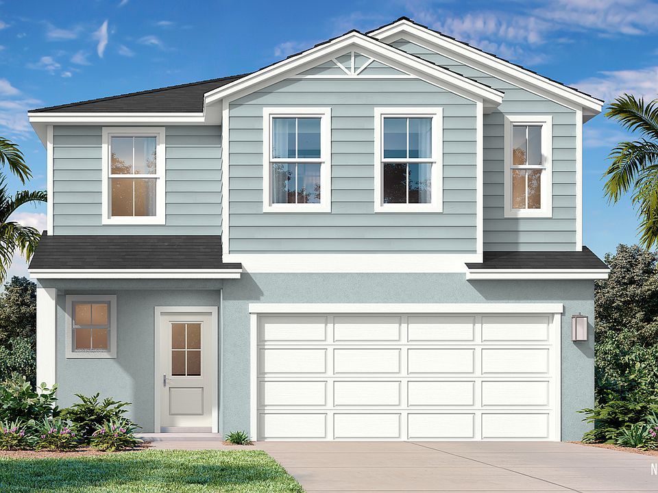 Naples Coastal elevation at Willowbrook North, a New lakefront home community in Winter Haven, FL