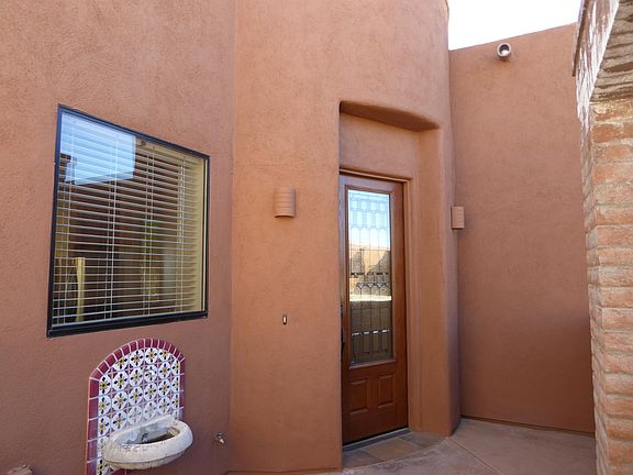 Fountain Located In Enclosed Entry Patio