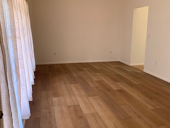 Front room with view of the park across the street.