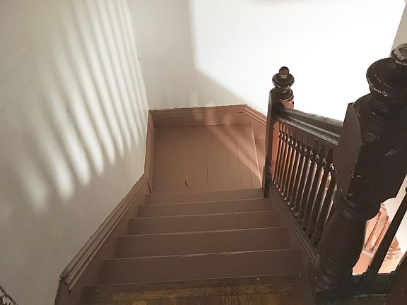 Staircase going down from second floor