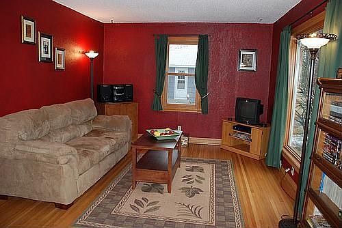 Gleaming hardwood and a wonderful picture window