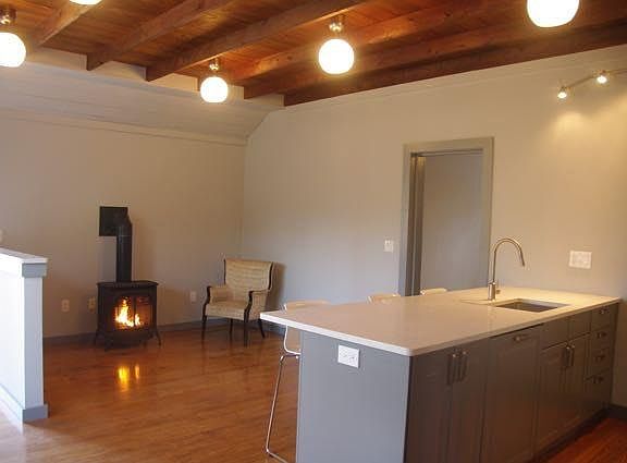 living room with propane fireplace for warmth and ambience