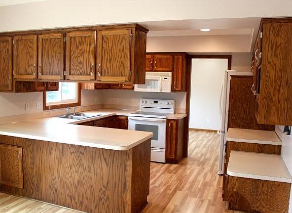 Kitchen with overhead Cabinets.
