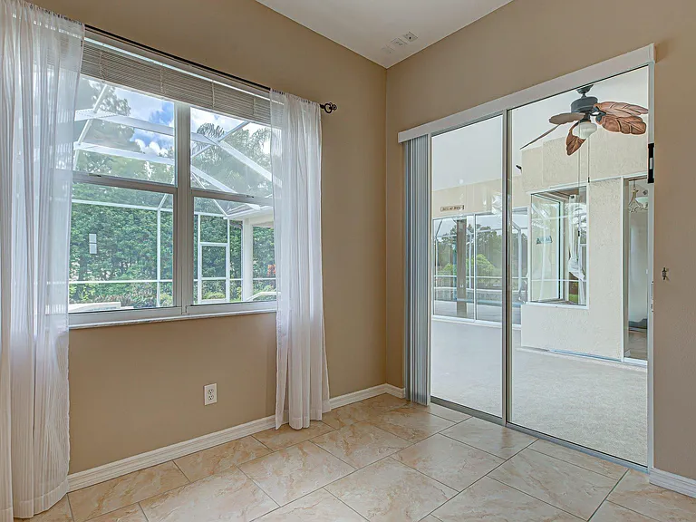 Master bedroom with access to lanai and pool