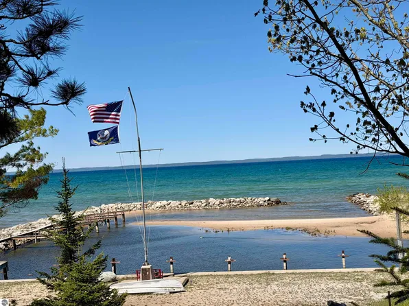 724 S Golden Beach Dr, Kewadin, MI 49648