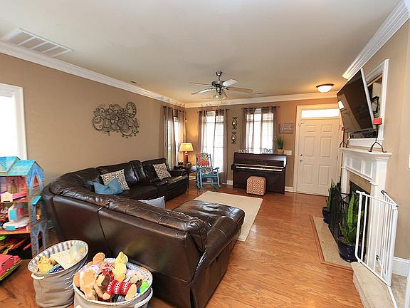 Spacious living room, hardwood floors, light!
