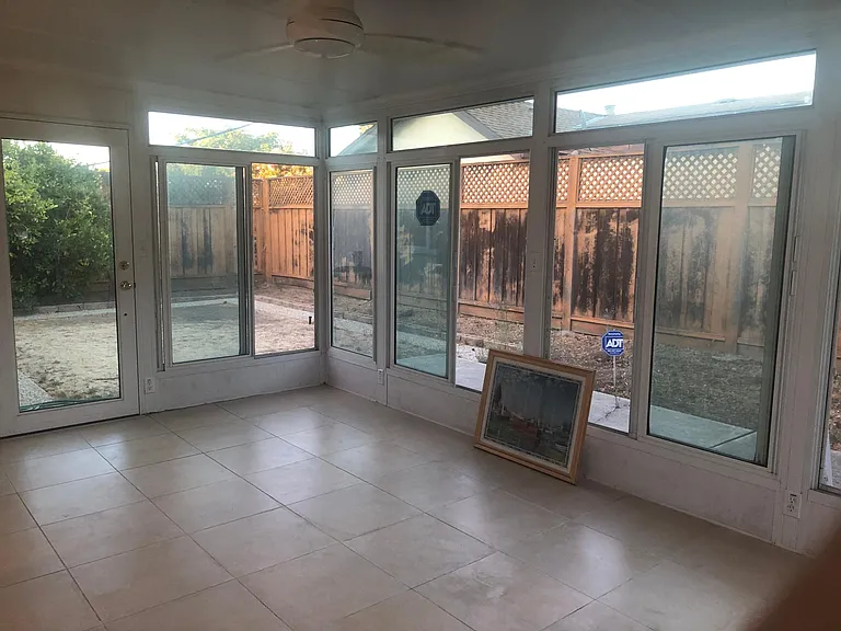 Bright and breezy sun room, all windows are extra large size. It can also be an office, reading room, play room, or afternoon tea space for guests, it's up to your imagination. Sun room was professionally built with city approved permits issued
