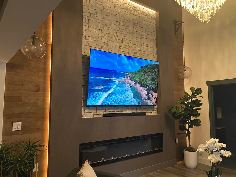 Smart TV beautifully integrated into a contemporary designer feature wall.