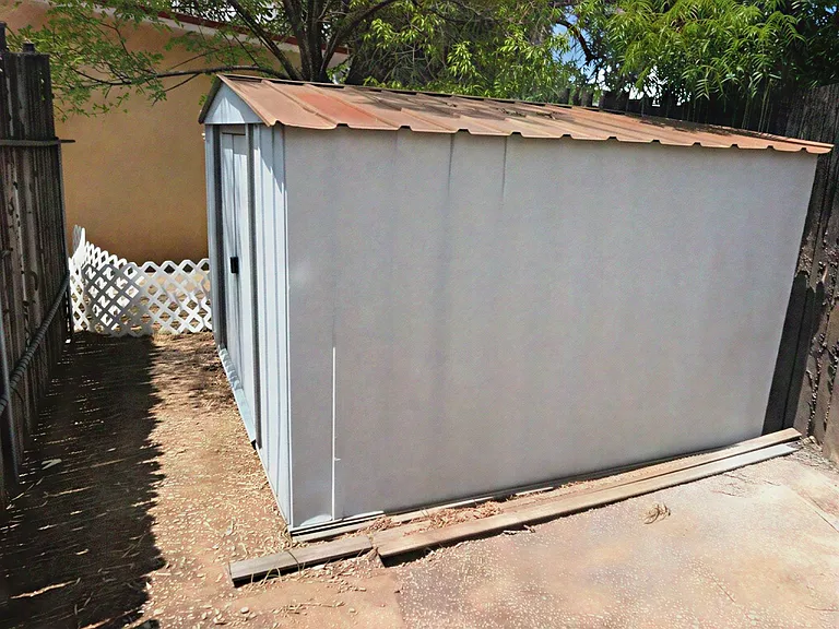 Shed for tenant storage accessible from the side yard.