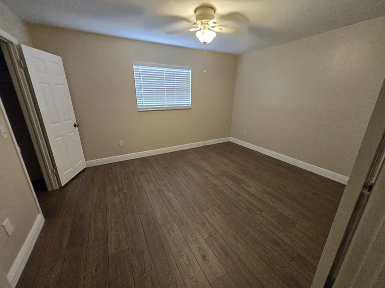 Bedroom, view from entrance open door is walk in closet