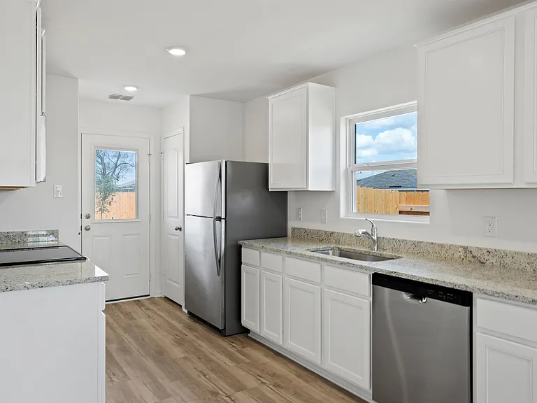 The kitchen features incredible counterspace.