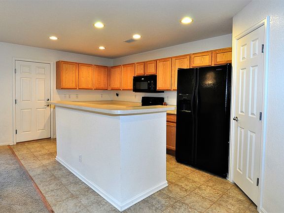 5th image of 18941 E 58th Ave