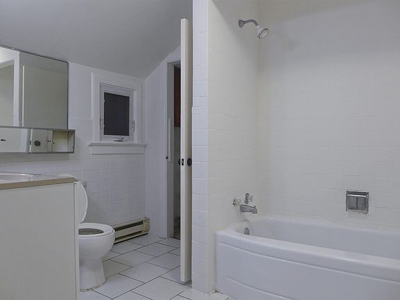 Spacious bathroom with closet