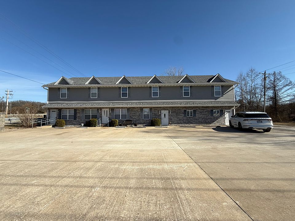 front facade, parking area